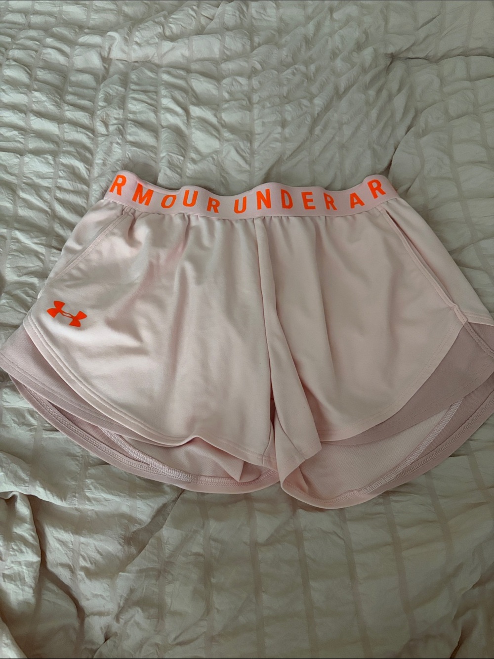 Under Armour Light Pink Women's Athletic Shorts with Orange Accents